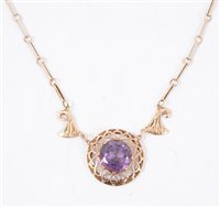 Lot 195 - A rose metal pendant necklace set with a 16mm round brilliant cut amethyst to the centre, the bar and jump ring chain necklace 44cm long, gross weight approximately 16.2gms.