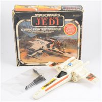Lot 180 - Star Wars Return of the Jedi X-Wing Fighter Vehicle with 'Battle Damaged' look feature, with original box.