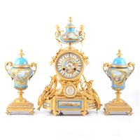 Lot 209 - Louis XV style gilt metal and Bleu Celeste porcelain mounted clock garniture
