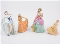 Lot 66 - Twelve Crown Devon lady figurines, five in the art deco style and having "Sutherland Figures" paper labels, two Crown Figurines, "From Paris" and "Caroline". (12)
