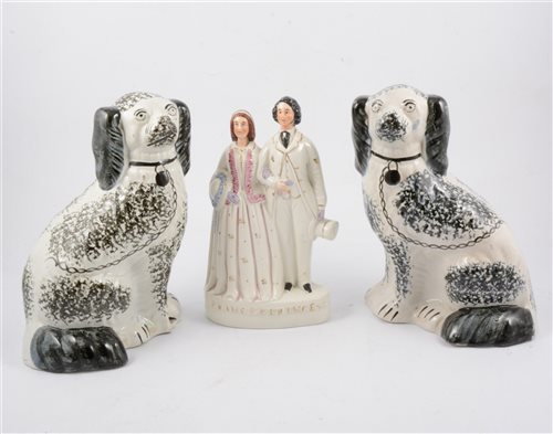 Lot 56 - Staffordshire pottery group, Prince & Princess of Wales, and three Staffordshire pottery dogs (4)