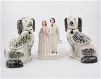 Lot 56 - Staffordshire pottery group, Prince & Princess of Wales, and three Staffordshire pottery dogs (4)