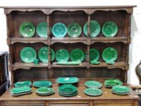 Lot 82 - Collection of green glazed leaf moulded pottery