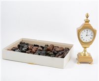 Lot 159 - A moonstone and onyx chess set and board, another chess set, and a brass mantel clock