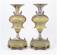 Lot 91 - A pair of green marble and cloisonne enamel garnitures, vase shaped candleholders each standing on six enamel feet, 32cm high.