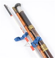 Lot 133 - Fishing equipment; including split cane rods, reels, tackle and accessories.