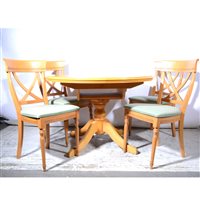 Lot 430 - Modern extending dining table and four chairs