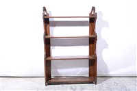 Lot 333 - A set of Victorian walnut hanging shelves