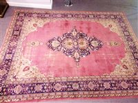 Lot 440 - A large Persian carpet