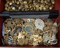Lot 183 - A quantity of Military cap badges, buttons and cloth badges.