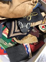 Lot 183 - A quantity of Military cap badges, buttons and cloth badges.