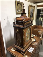 Lot 215 - Late Victorian figured walnut mantel clock