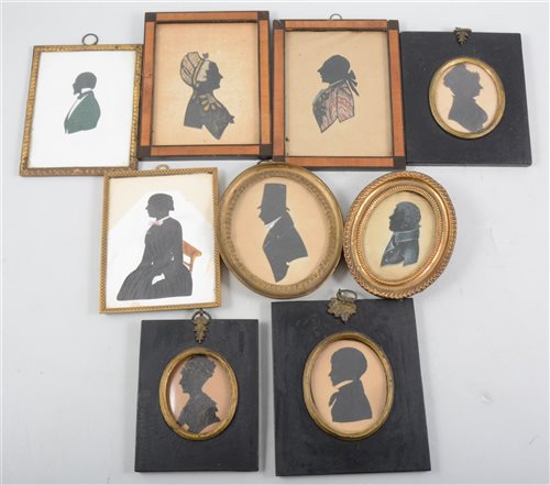 Lot 240 - Nine Georgian and later framed silhouettes, male and female profiles in costumes contemporary to the times.