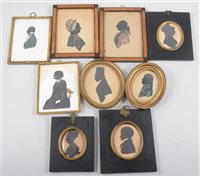 Lot 240 - Nine Georgian and later framed silhouettes, male and female profiles in costumes contemporary to the times.