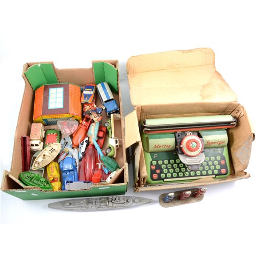 Lot 99 - Tin-plate, metal and plastic models, including automatic garage by Glam toys, typewriter, cast metal petrol pumps