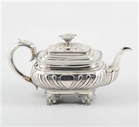 Lot 268 - A George III silver teapot by George Burrows (II), the rectangular body wrythern fluted with gadroon edge on cast claw and floral feet