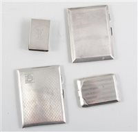 Lot 277 - Two small silver engine turned cigarette cases, Birmingham 1926, 1931, a book match Birmingham 1925 and an 800 matchbox holder. (4)