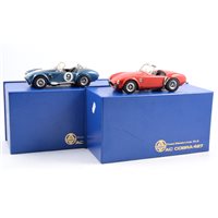 Lot 262 - Those Classic Lines metal model CL3 AC Cobra 427 in red and another with racing number no.9, approximately 1:24 scale, both with wood plinths and boxes, (2).