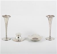 Lot 279 - A pair of silver fluted bud vases, 15cm, filled bases, Chester 1897, a capstan inkwell, Birmingham 1907