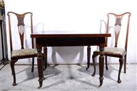 Lot 419 - A mahogany draw-leaf dining table; and a set of four Edwardian high-back dining chairs. (5)