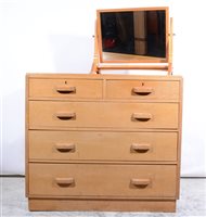 Lot 368 - A Light oak chest of drawers; and similar toilet mirror. (2)