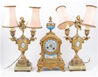 Lot 117 - French gilt spelter and bleu celeste porcelain clock garniture in the Louis XVI style.