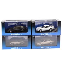 Lot 281 - Autoart 1:43 scale models, 53622 Jaguar XKR Coupe (white), 53601 Jaguar XJR (black), 53503 Jaguar C-Type (bronze), 53573 Jaguar XJ8 (gold), all boxed, (4).