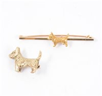 Lot 194 - A Scottie Dog brooch marked 9ct, 20cm, approximate weight 7.8gms, and a 50mm bar brooch marked 15ct with a Scottie Dog to centre, 4.5gms. (2)