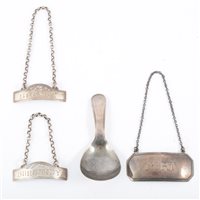 Lot 157 - George III silver caddy spoon, probably John Shea, London 1810; and three white metal labels (4)