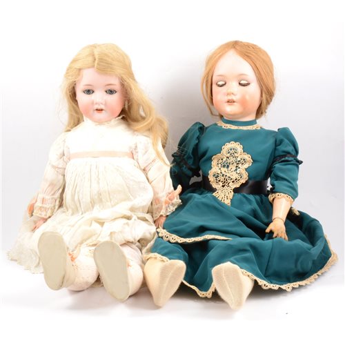 Lot 229 - Two Bergman Germany bisque head dolls, 1915 and 1916, and a Victorian dolls pram (3).
