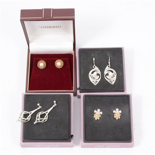Lot 195 - Four pairs of earrings for pierced ears, a pair of 9  carat yellow gold rope design studs set with a 5.5mm cultured pearl, three pairs of silver earrings by Ola Gorie Scottish Originals. (4)