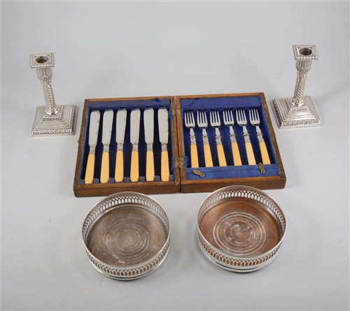Lot 164 - A silver Scandanavian spoon, marked Thune 800, a boxed set of silver plated cutlery, other spoons and two bottle coasters.