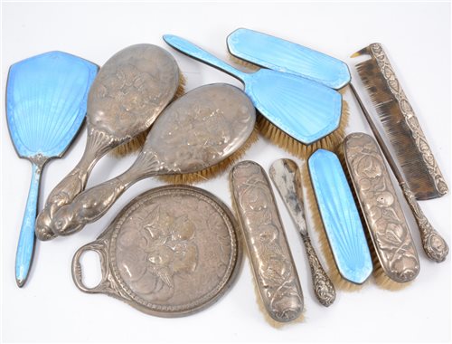 Lot 242 - Four-piece silver and blue enamelled dressing table brush set by Charles S Green & Co Ltd, Birmingham 1927; a six-piece silver dressing table set by William Comyns & Sons, London 1901... (12)
