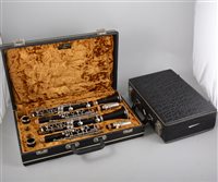 Lot 160 - Noblet Artist clarinet, cased, and a clarinet case, (2).
