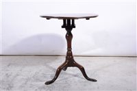 Lot 363 - A Georgian oak and mahogany birdcage tripod table.