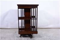 Lot 334 - An Edwardian mahogany inlaid revolving bookcase