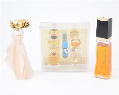 Lot 174 - A selection of vintage perfumes, including 'Organza Incedence' by Givenchy, 'Kyoto' by Kanebo, miniatures in gift boxes by Yves Saint Laurent and French Options and others plus an atomiser. (11)