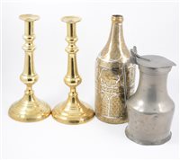 Lot 161 - A Persian brass, copper and white metal inlaid bottle, and other metalwares.