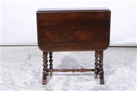 Lot 394 - A small Edwardian walnut Sutherland table.