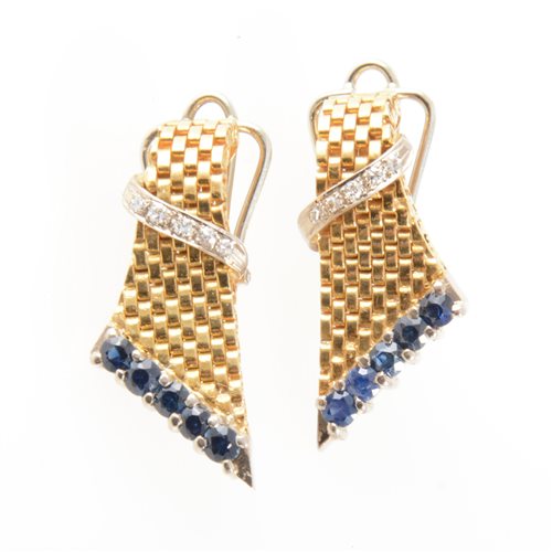 Lot 187 - A pair of 18 carat yellow and white gold earclips, the yellow gold tapered brick construction set with five sapphires