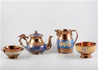 Lot 33 - A collection of Victorian copper lustre pottery.