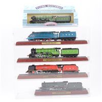Lot 37 - Sixteen model railway engine models on plinths and in plastic presentation cases