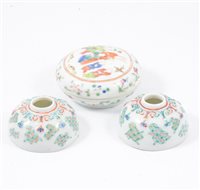 Lot 25 - Chinese famille rose circular cushion shape box, and a pair of polychrome decorated circular brush pots