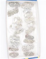 Lot 229 - Twenty vintage paste set double clips, some fitted with a brooch pin and having patent numbers. (20)