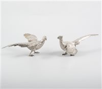 Lot 267 - Pair of cast silver models of a Cock & Hen Pheasant, bearing import marks, London 1966, 10oz, length 19cm
