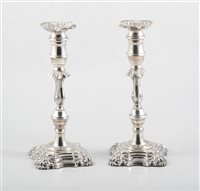 Lot 269 - Pair of George II style silver table candlesticks, Davies Bros., Birmingham 1972, wieghted 26oz