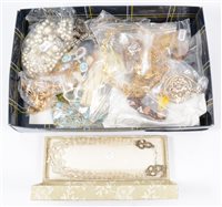 Lot 228 - A collection of vintage costume jewellery including simulated pearls, crystal necklaces, brooches, badges, earrings, gilt metal chains, etc.