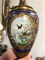 Lot 90 - A pair of French Sevres style garniture ewers (2)