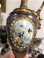 Lot 90 - A pair of French Sevres style garniture ewers (2)