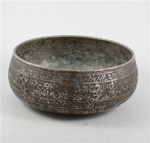 Lot 212 - Islamic engraved copper bowl, 26cm diameter.